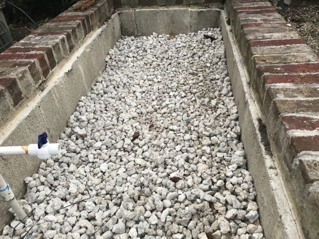 Layer of rocks in garden bed